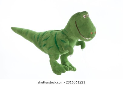 green plush dinosaur isolated on white background