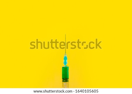 Similar – Medical syringe on colorful background.