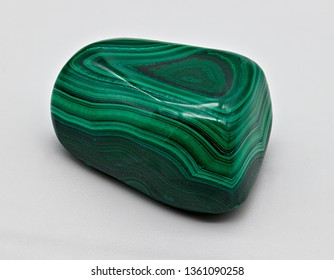 Green Polished Shiny Malachite Stone Sample Isolated On White Limbo Background