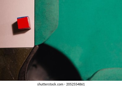 Green Pool Table With A Blue Chalk. Viewed From Above. Horizontal Image.