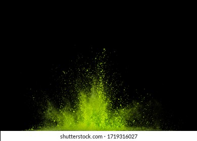 Green Powder Explosion Isolated On Black Background.