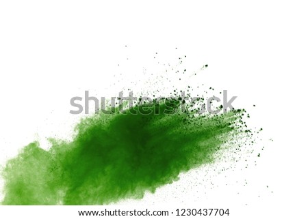 green powder explosion isolated on white background.