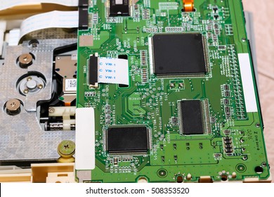 Green printed of the inside of DVD disk drive (cd-rom) - Shutterstock ID 508353520