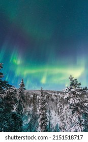 Green And Purple Northern Lights In Rovaniemi Finnish Lapland