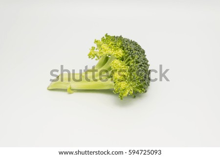 Similar – Small pieces of raw broccoli on white wood, Close up