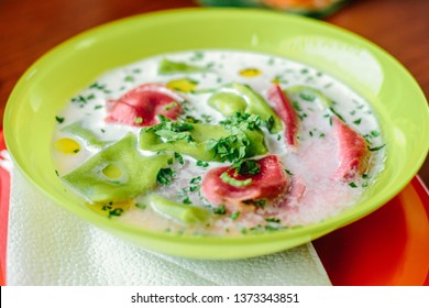 Green And Red Ravioli In Soup For Kids.