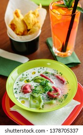 Green And Red Ravioli In Soup For Kids.