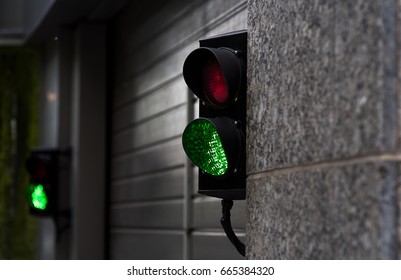 Green and Red Stop Light in garage enter