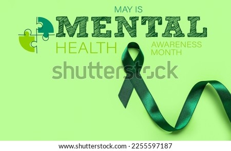 Green ribbon and text MAY IS MENTAL HEALTH AWARENESS MONTH