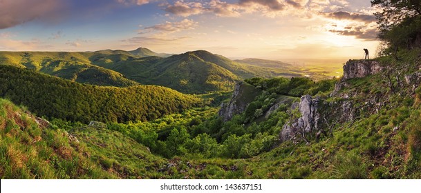 Green Rocky Moutain At Sunset