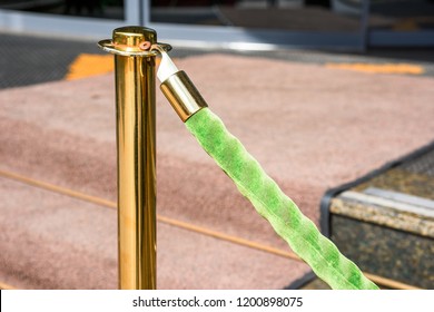 Green rope barrier on the stairs - Powered by Shutterstock