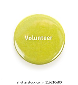 Green Round Volunteer Button Isolated On White