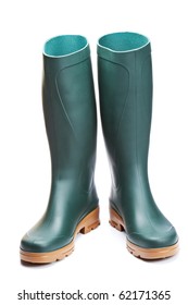 Green rubber boots with soft shadow on white background