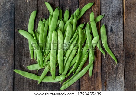 green runner beans on wooden background Foto stock © 