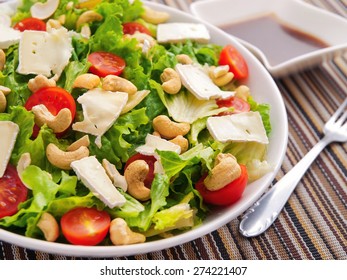 Green Salad With Brie, Cashew And Cherry Tomatos