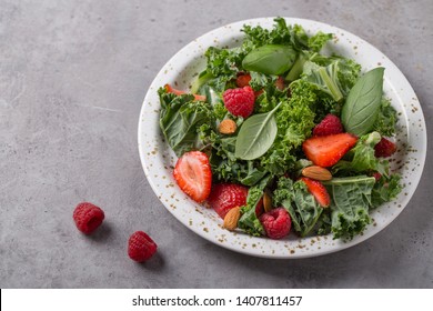 Green Salad With Kale Salad, Basil, Strawberry, Raspberry And Nuts