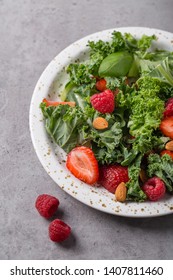 Green Salad With Kale Salad, Basil, Strawberry, Raspberry And Nuts