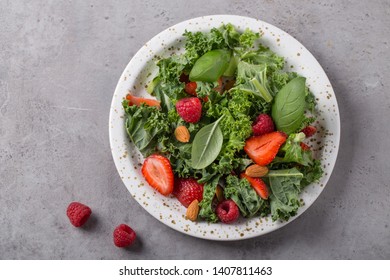 Green Salad With Kale Salad, Basil, Strawberry, Raspberry And Nuts