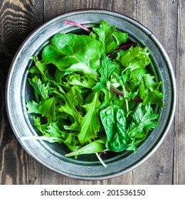 Green Salad On Rustic Background