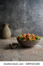 Green Salad With Parmesan Cheese Falling On Top. Vibrant Salad. Raw Healthy Meal. Earthy Tones. 