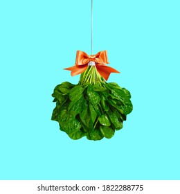 Green Salat Christmas Ball For Tree Ornament On A Color Background.