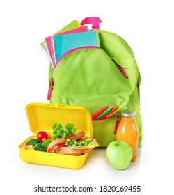 Green School Bag And Healthy School Lunch Box Isolated On White Background.