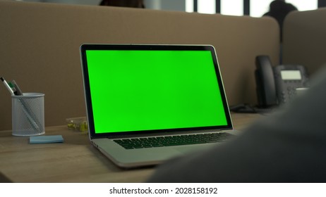 Green Screen Laptop Computer. Closeup Businessman Hands Typing Laptop Green Screen At Office Workplace. Unrecognizable Business Man Working Laptop Computer Chroma Key