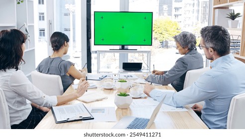 Green screen, meeting and video call with business people in boardroom of office for development. Mockup space, monitor and tracking markers in corporate workplace for upskill training or webinar - Powered by Shutterstock