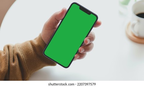 Green screen mobile phone illustration mockup is perfect for promotional videos or chroma key photo mockups