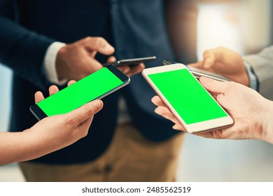 Green screen, phone and hands in group for contact us, online networking and connection in circle. Entrepreneur or people with mobile app for business news, b2b and chat mockup with cloud sharing - Powered by Shutterstock