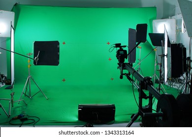 Green Screen In Studio With Lighting Equipments