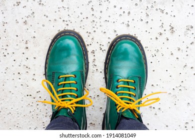 Green shoes and yellow shoelaces