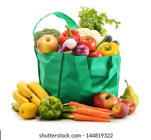 Green shopping bag with grocery products on white background - Shutterstock ID 144819322