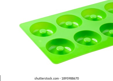 Green Silicone Shape Donut Isolated On White Background. Bakeware.