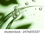 Green skincare product liquid bubble close-up