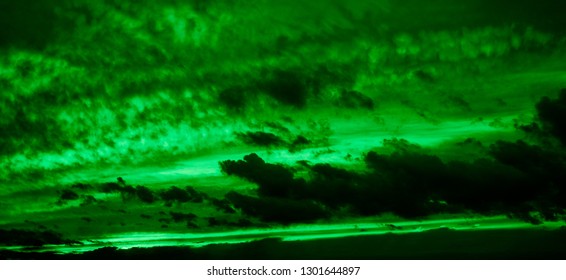 Green sky and dark clouds