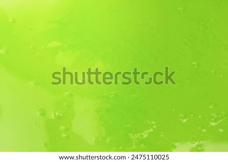 Green slime toy as a background. Top view. 
