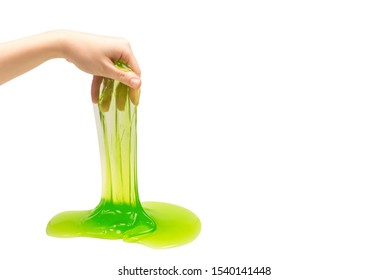 Green Slime Toy In Woman Hand Isolated On White.