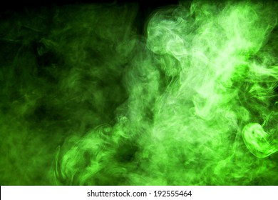 Green Smoke On Black Background.