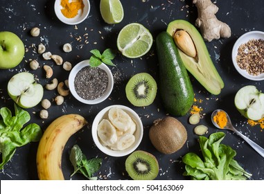 Green Smoothie Ingredients. Cooking Healthy Detox Smoothies. On A Dark Background, Top View