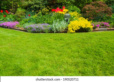 green space with flowers in the background