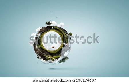 Green sphere landscape with grass and clear water . Mixed media