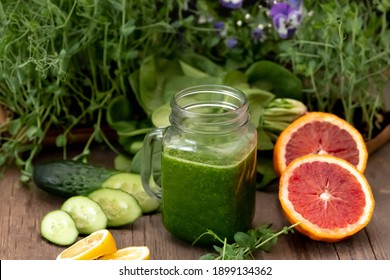 
Green spinach cocktail in a glass with a handle. Detox diet. Healthy food concept. Vegetarian food