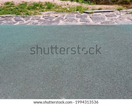 green Sports surface for running in the park