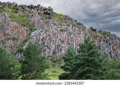 Green spruce on the background of the rocky mountains of Georgia. - Powered by Shutterstock