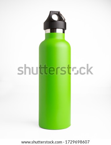 Green stainless steel thermos bottle on white background for mockup