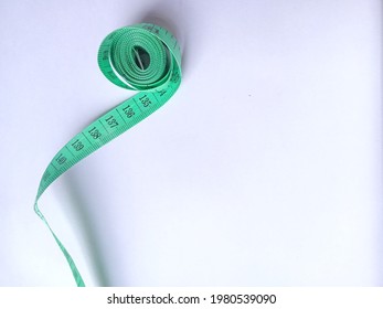 green tape measure for tailor  - Powered by Shutterstock