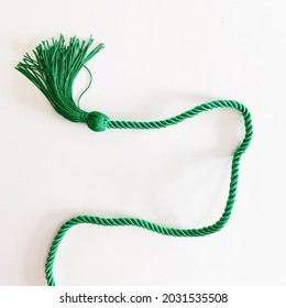 Green Tassel Cord Winding On White Background