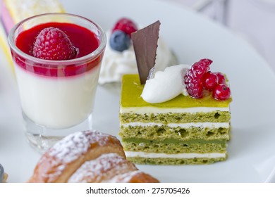 Green Tea Cake With Topping And Pannacotta With Rasberry Jelly.