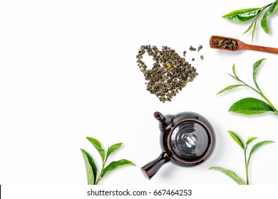 Green Tea, Green Tea Leaf And Tea Pot On White Background. Top View
